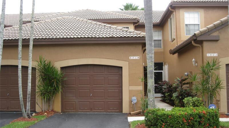 Property Photo:  1348 Veracruz Lane 4-8  FL 33327 