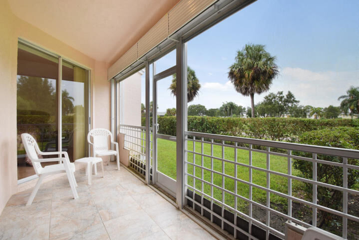 Property Photo:  101 Muirfield Court 101-F  FL 33458 