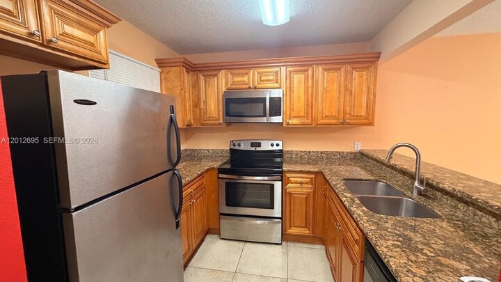 Property Photo:  1760 Windorah Way H  FL 33411 