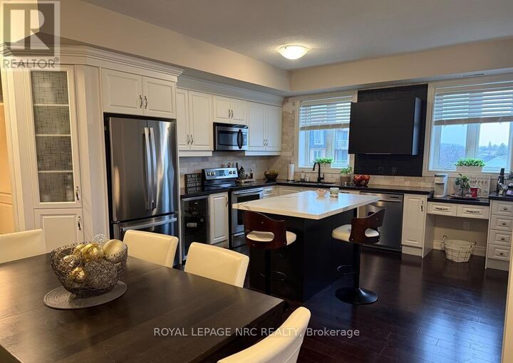 Property Photo:  8111 Forest Glen Drive 418  ON L2H 2Y7 