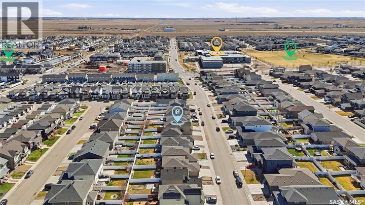 Property Photo:  4810 Green Brooks Way E  SK S4V 3K6 