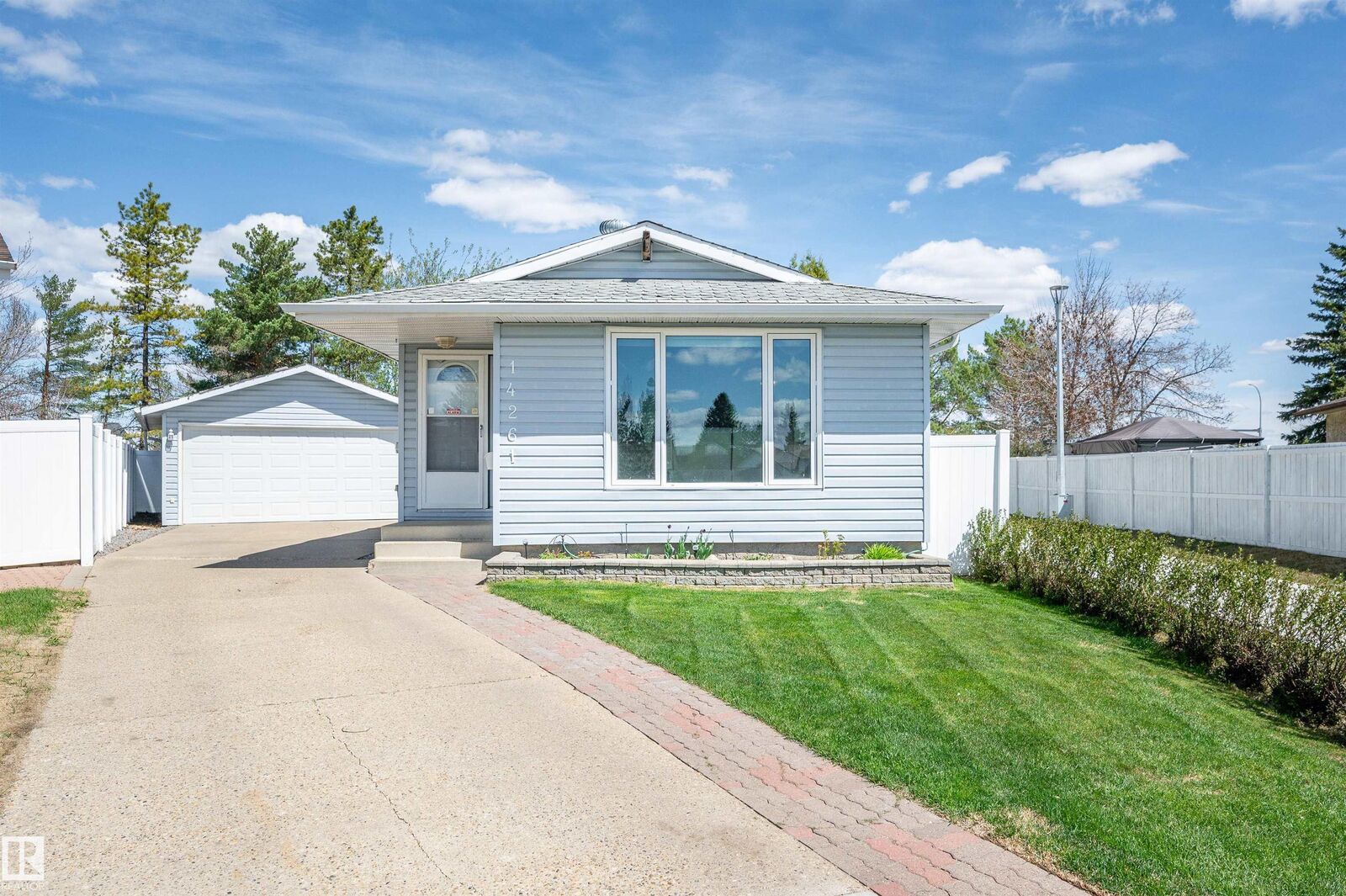 Property Photo:  14261 30 Street NW  AB T5Y 1M7 