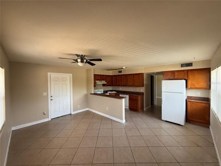 Property Photo:  117 N Evergreen Avenue 105  FL 33755 