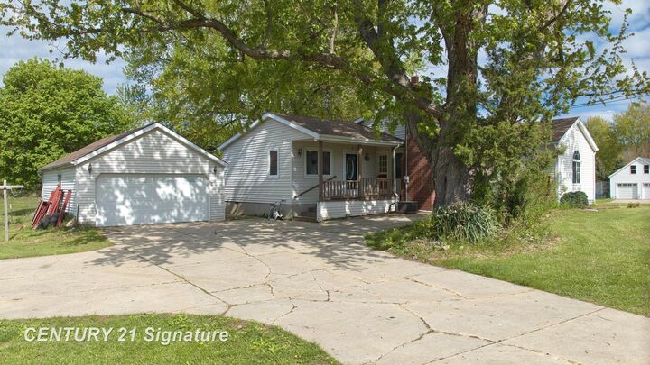 Property Photo:  10021 Clio Road  MI 48420 