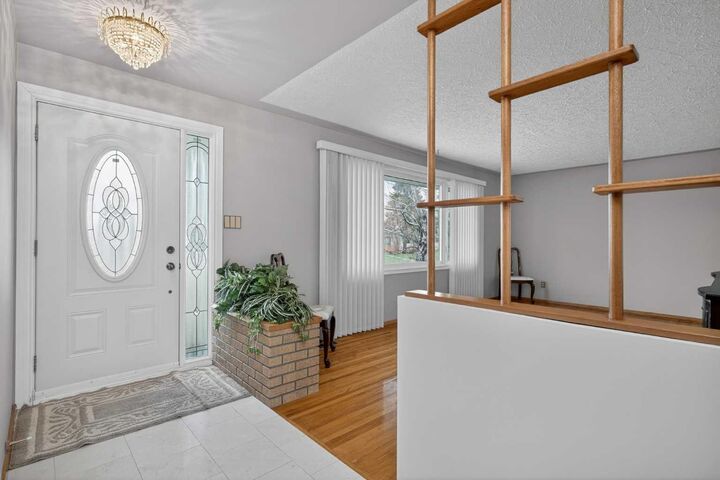Property Photo:  249 Westminster Drive SW  AB T3C 2T7 