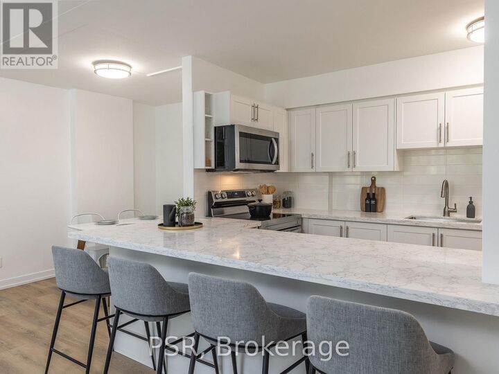 Property Photo:  240 Markland Drive 208  ON M9C 1R3 