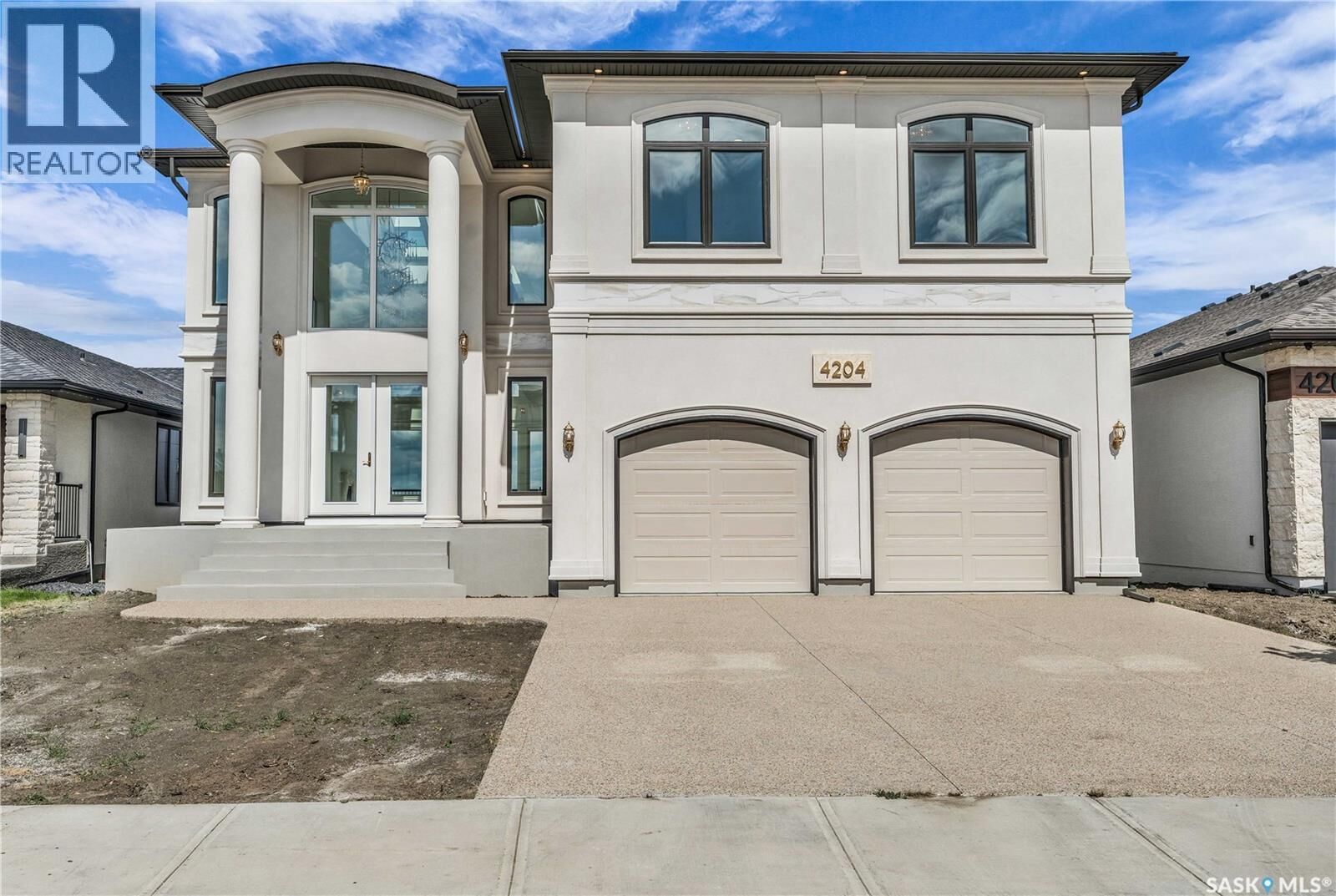 Property Photo: 4204 Elderberry Crescent E SK S4V 3V3
