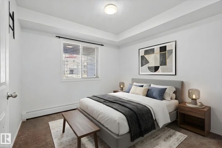 Property Photo:  12035 22 Av SW 117  AB T6W 2X9 