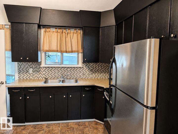 Property Photo: 12418 92 Street NW AB T5G 1B7