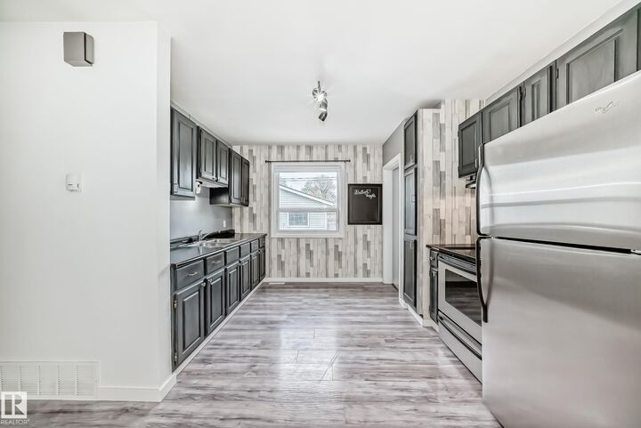 Property Photo:  12030 48 Street NW  AB T5W 2Y8 