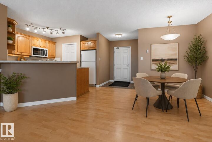 Property Photo:  9760 174 Street NW 104  AB T5T 6J4 