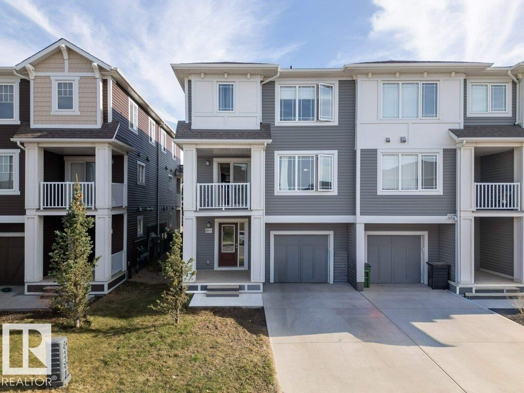 Property Photo:  20315 16 Avenue NW  AB T6M 1K8 