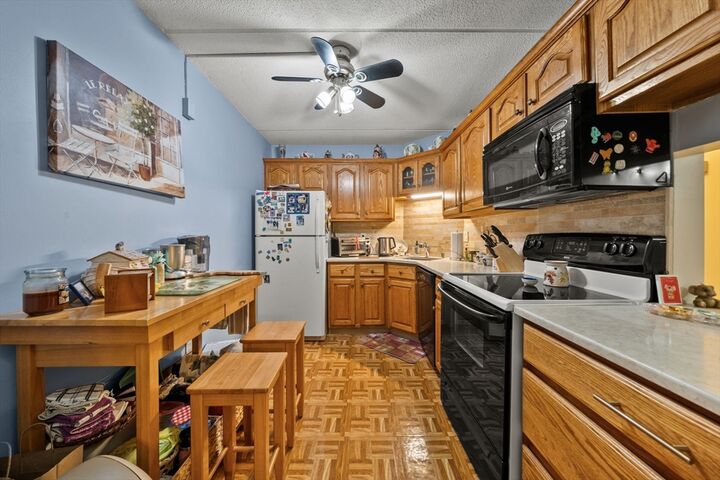 Property Photo:  159 Main 23C  MA 02180 