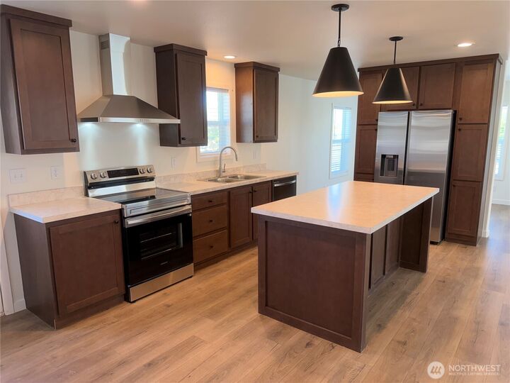 Property Photo:  205  Pleasant Avenue 44  WA 98930 