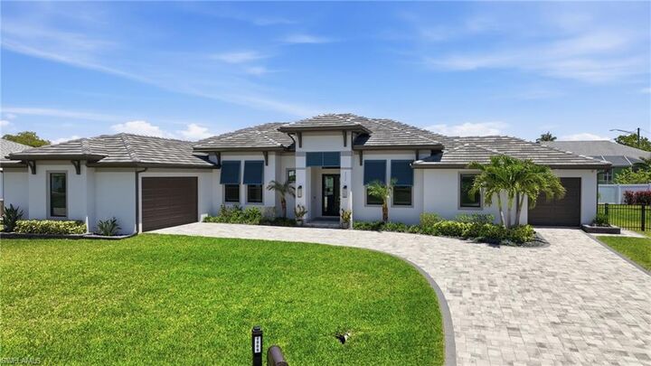 Property Photo:  4009 SW 25th Pl  FL 33914 