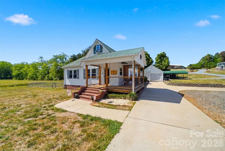 Property Photo:  4039 Hartland Road  NC 28645 