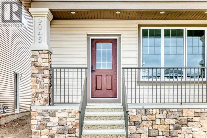 Property Photo: 5045 Harmony Circle AB T3Z 0K5