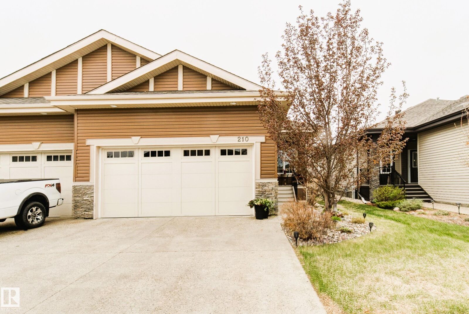 Property Photo:  50 Heatherglen Drive 210  AB T7X 0R6 