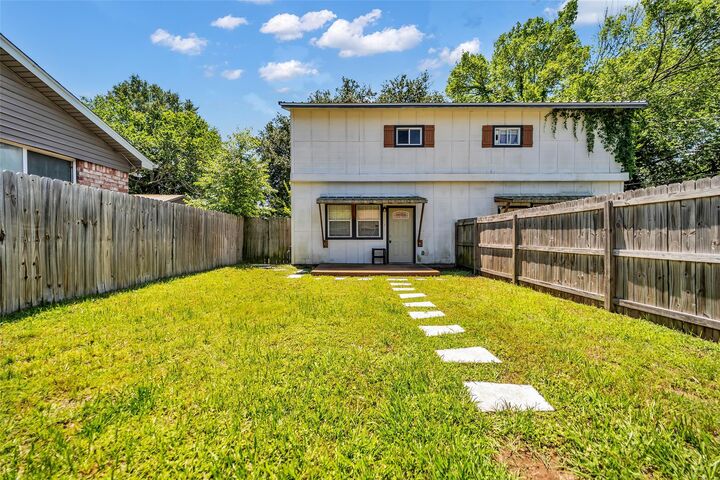 Property Photo:  201-A W Mink Street  TX 77378 