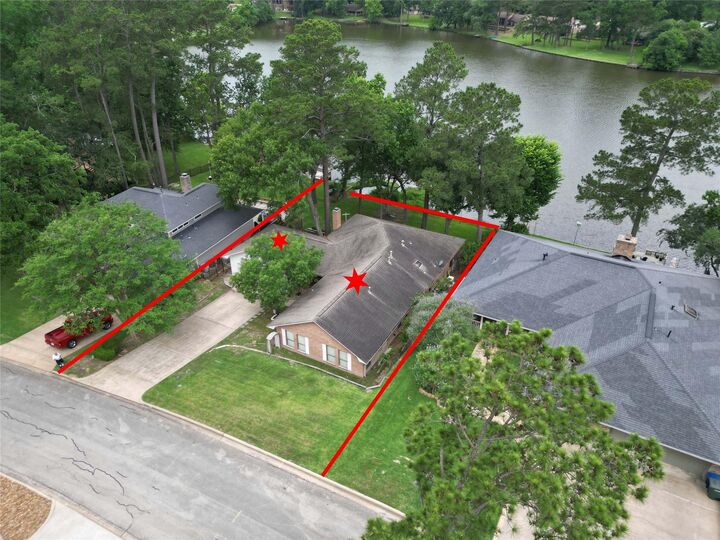 Property Photo:  1925 East Lake Drive  TX 77340 