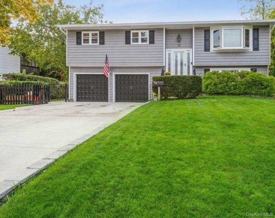Property Photo:  58 Oakridge Drive  NY 11706 