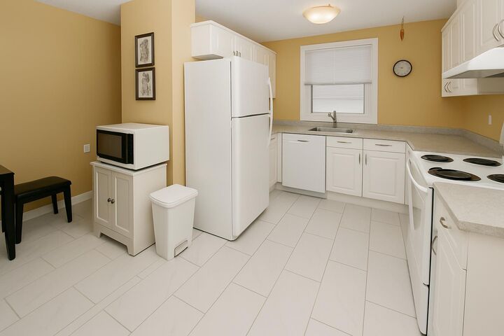 Property Photo:  884 Rundlecairn Way NE  AB T1Y 2R7 