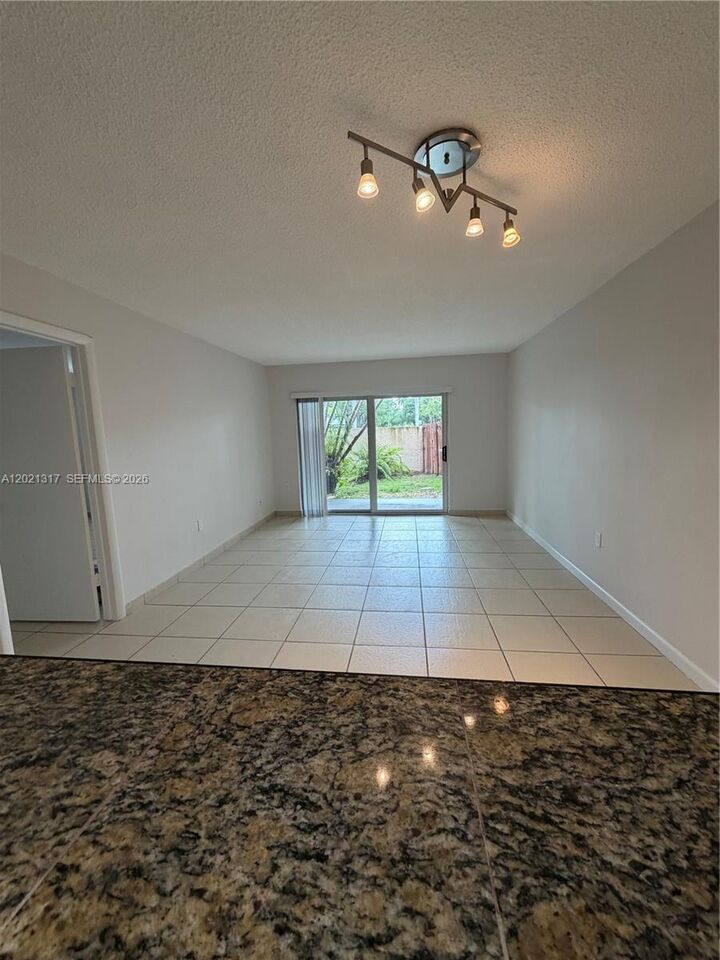 Property Photo:  11201 SW 88th St 102A  FL 33176 
