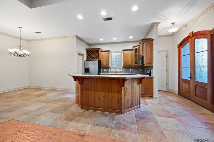 Property Photo:  10655 Woodland Oaks  LA 70809 