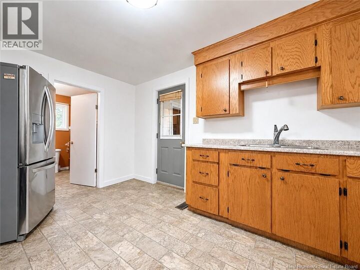 Property Photo:  37 St-Jean Baptiste Street  NB E4S 3W1 