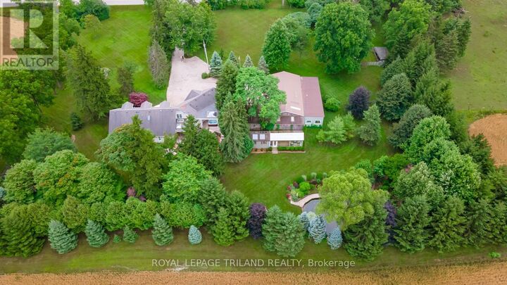 Property Photo:  2416 Sunningdale Road West  ON N6H 5L2 