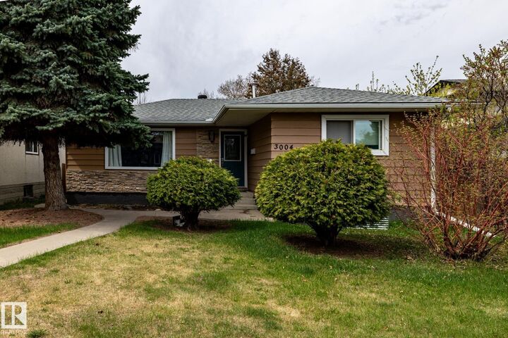 Property Photo:  3004 68 Street NW  AB T6K 1N6 