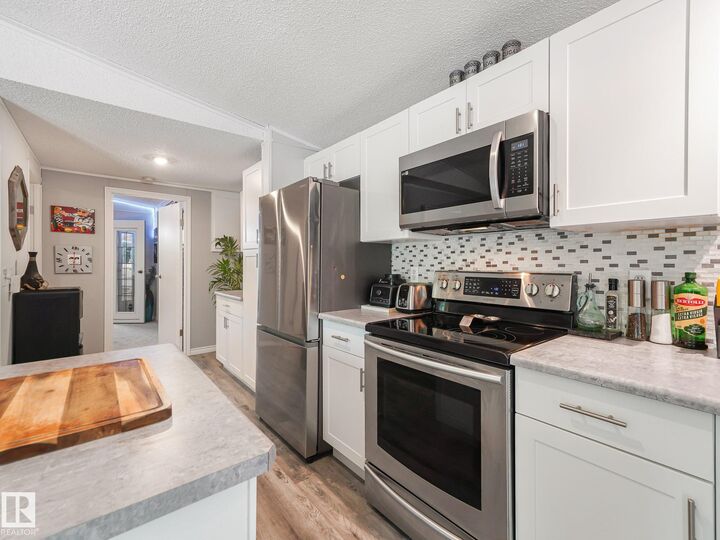 Property Photo:  304 57323 Rgrd 30  AB T0E 1A0 