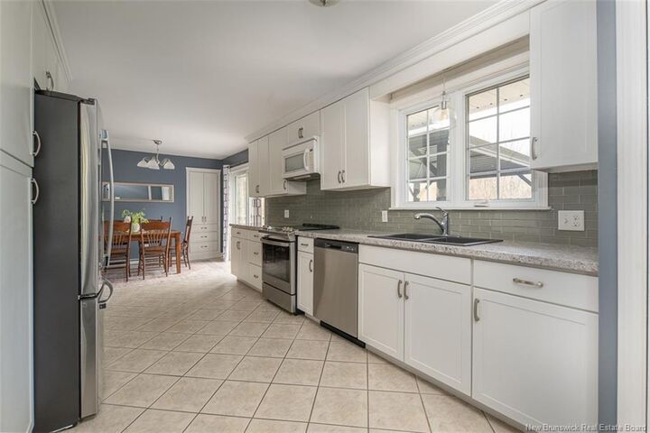Property Photo:  122 Burpee Street  NB E3A 1M5 