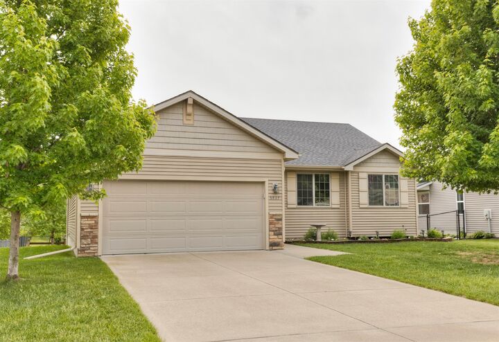 Property Photo:  5817 NW 52nd Street  IA 50131 