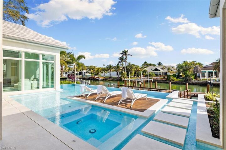 Property Photo:  3455 Gin Ln  FL 34102 
