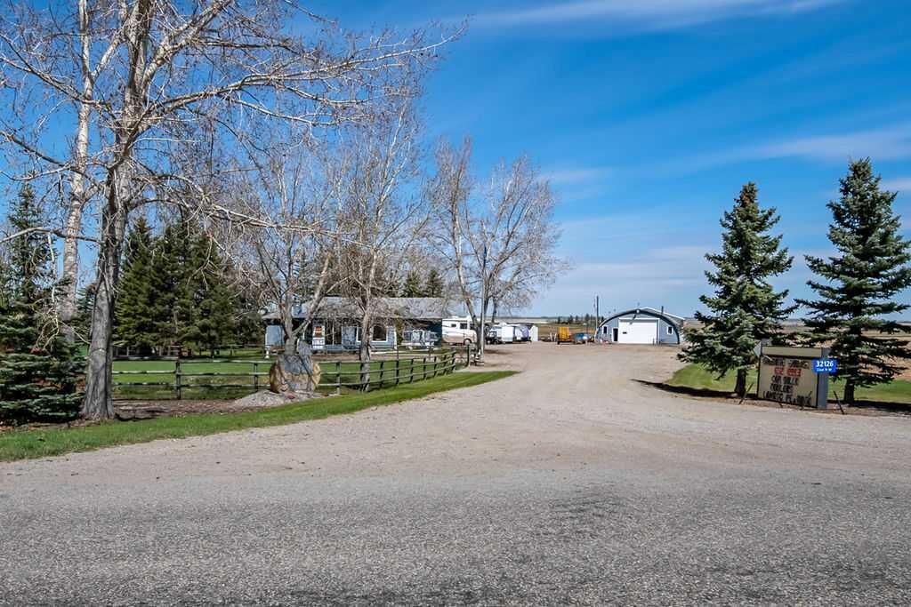 Property Photo:  32126 Coal Trail W  AB T1V 1M6 