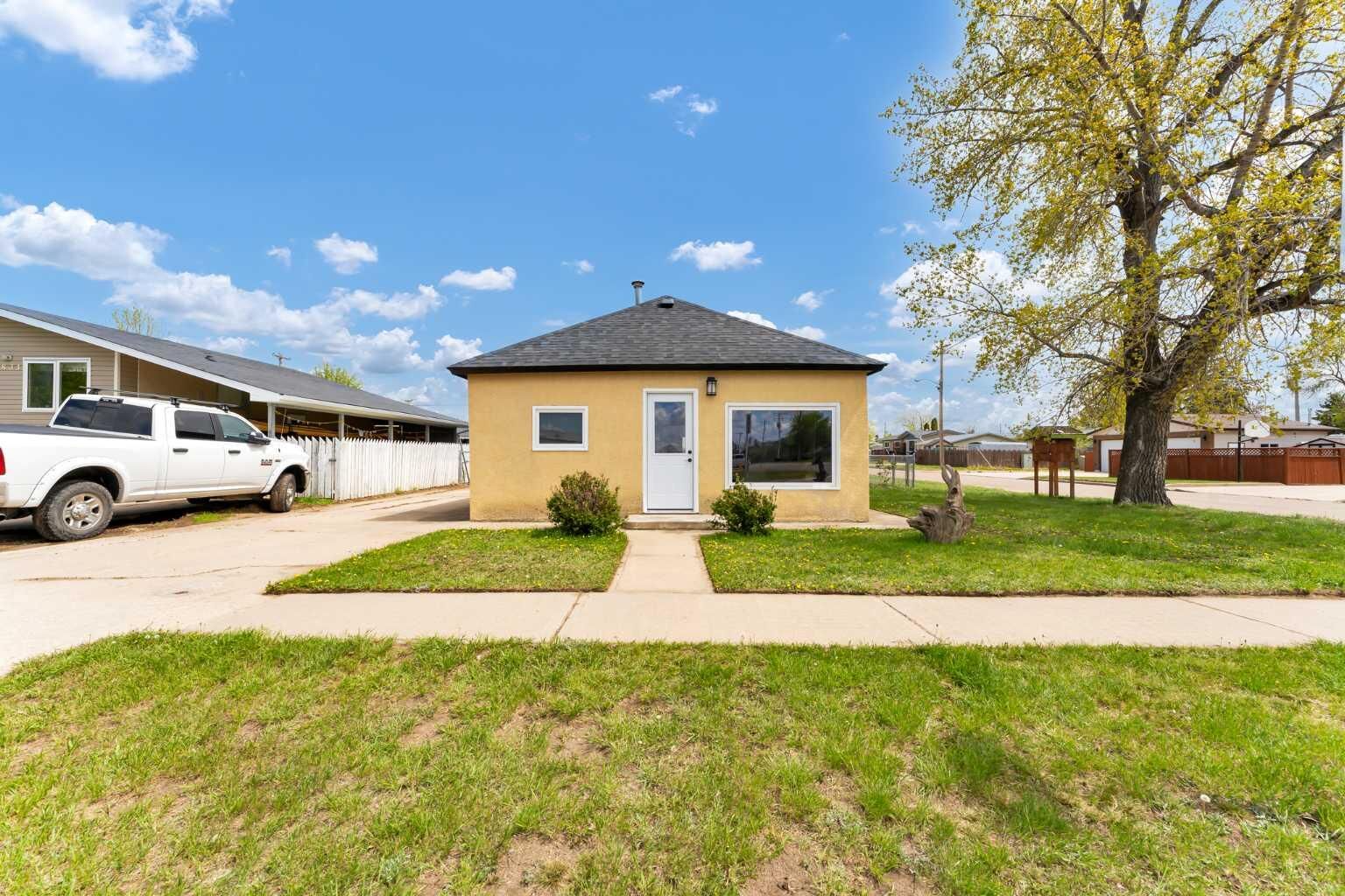 Property Photo:  837 Main Street S  AB T0J 2P0 