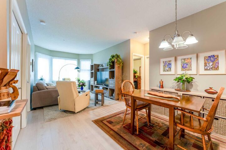 Property Photo:  8 Prestwick Pond Terrace SE 206  AB T2Z 4P3 