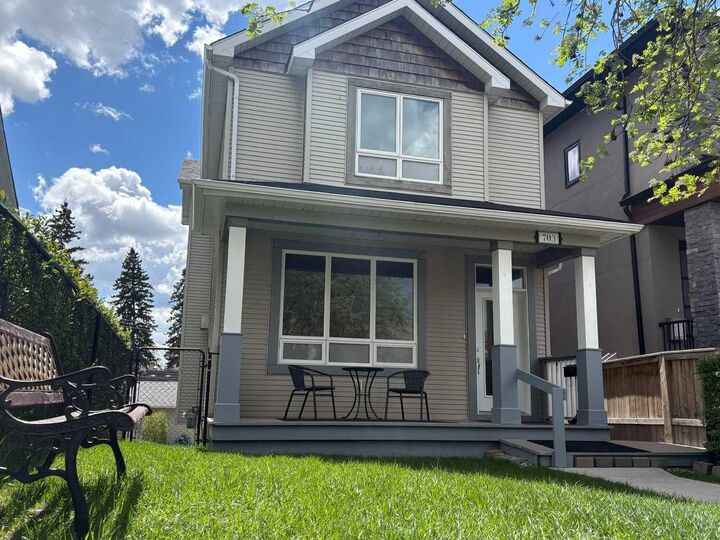 Property Photo:  703 52 Avenue SW  AB T2V 0B6 