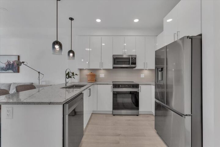 Property Photo:  5504 Brydon Crescent 212  BC V3A 0R3 