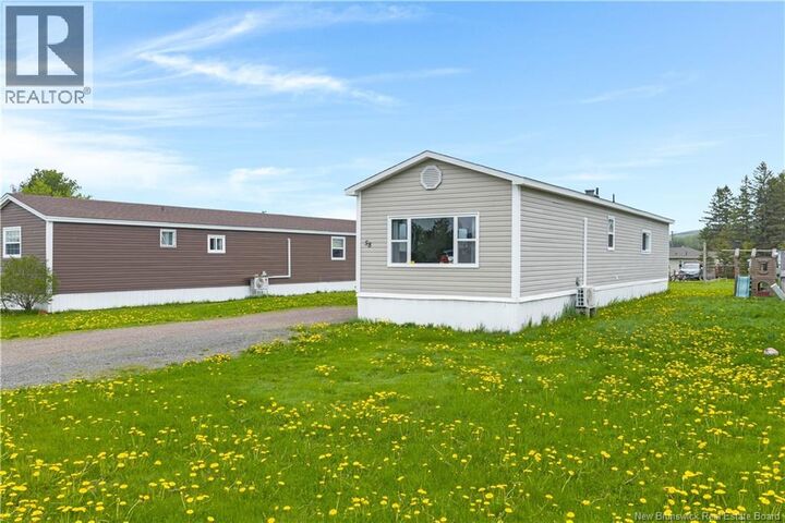 Property Photo: 58 Orchard Crescent NB E4E 3X7