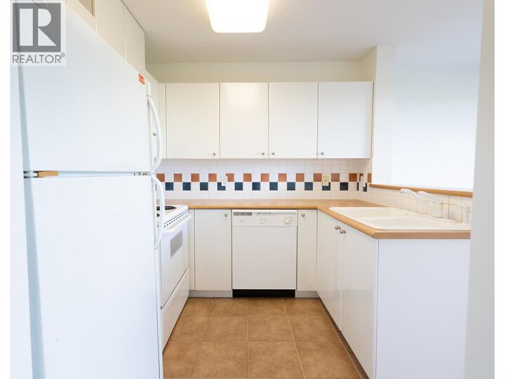 Property Photo:  6611 Southoaks Crescent 807  BC V5E 4L5 