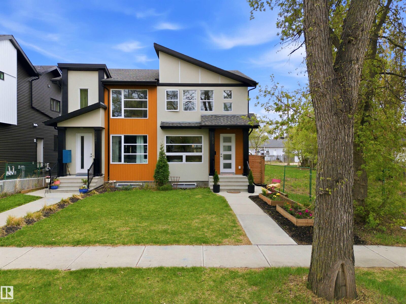 Property Photo:  11639 128 Street NW  AB T5M 0X3 