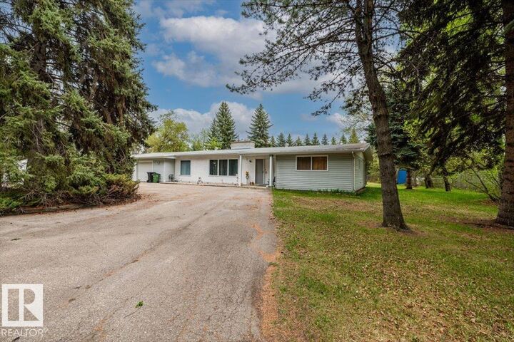 Property Photo:  4411 209 Street NW  AB T6M 2P3 