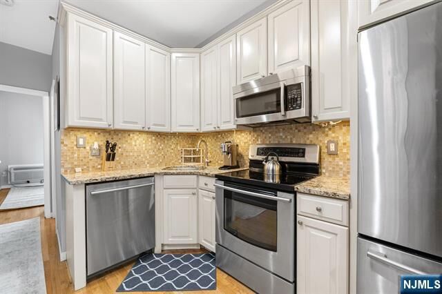 Property Photo:  403 Monroe Street 3L  NJ 07030 