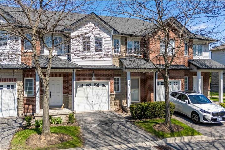 Property Photo: 232 Stonehenge Drive 26 ON L9K 1R5