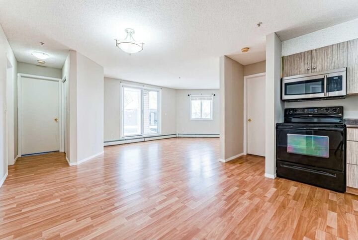Property Photo:  1717 60 Street SE 102  AB T2A 7Y7 