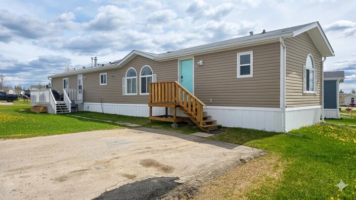 Property Photo: 142 Clark Crescent AB T8W 5K5