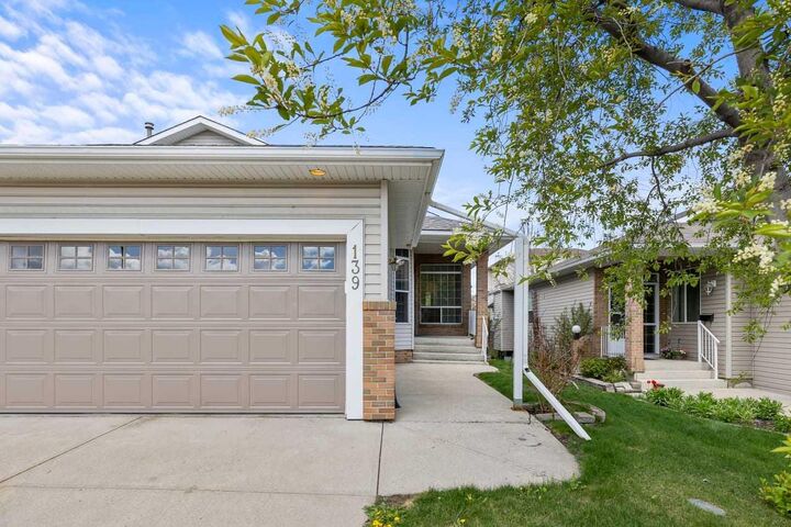 Property Photo: 139 Hidden Valley Green NW AB T3A 5L8