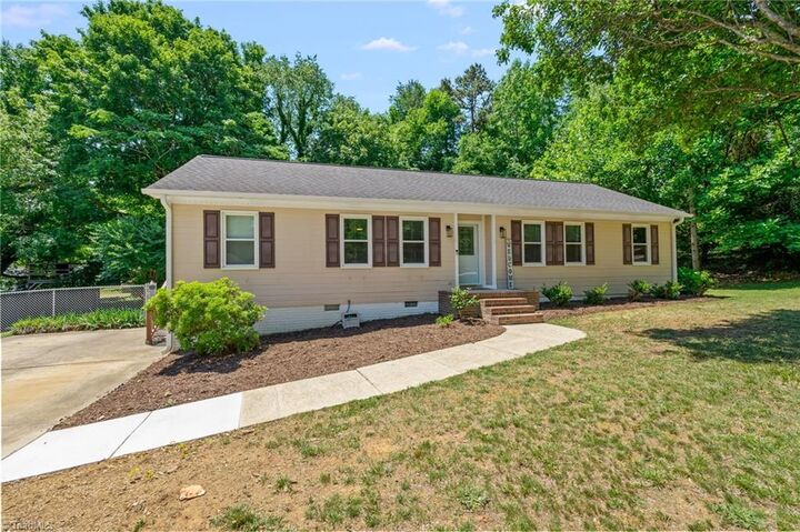 Property Photo:  1800 Rivertrace Point  NC 27265 